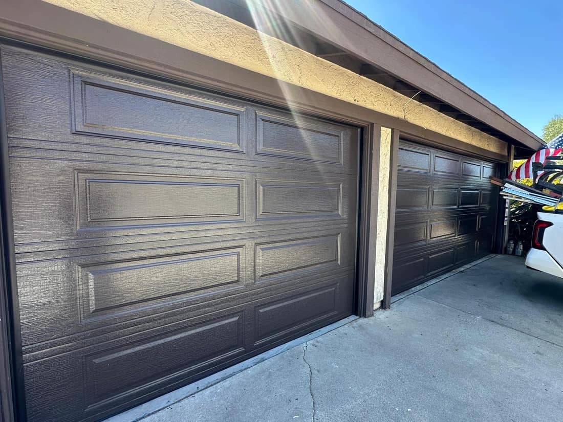 New black long-panel steel garage door