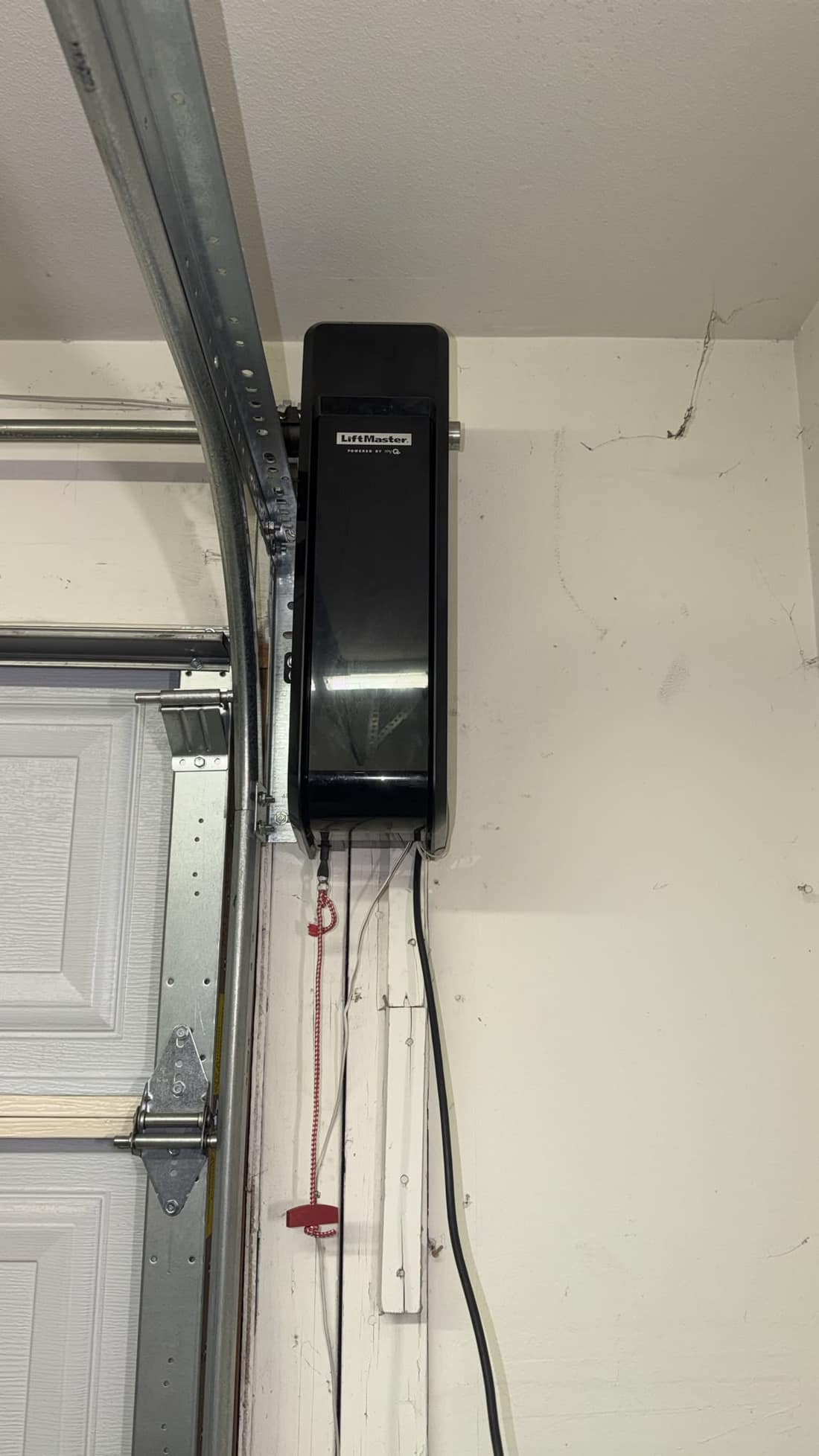 Wall-mount smart garage door opener installation
