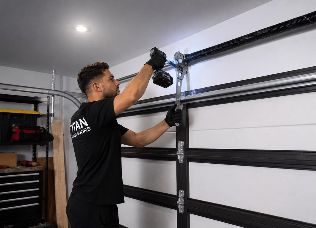Titan technician servicing a garage door